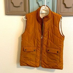 Fall colored vest.